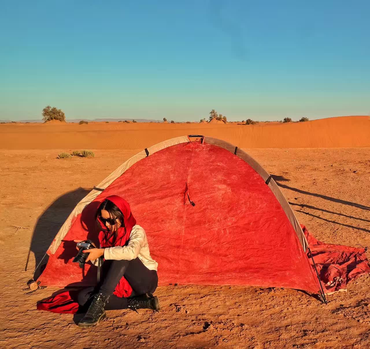 Tent and camera in the desert